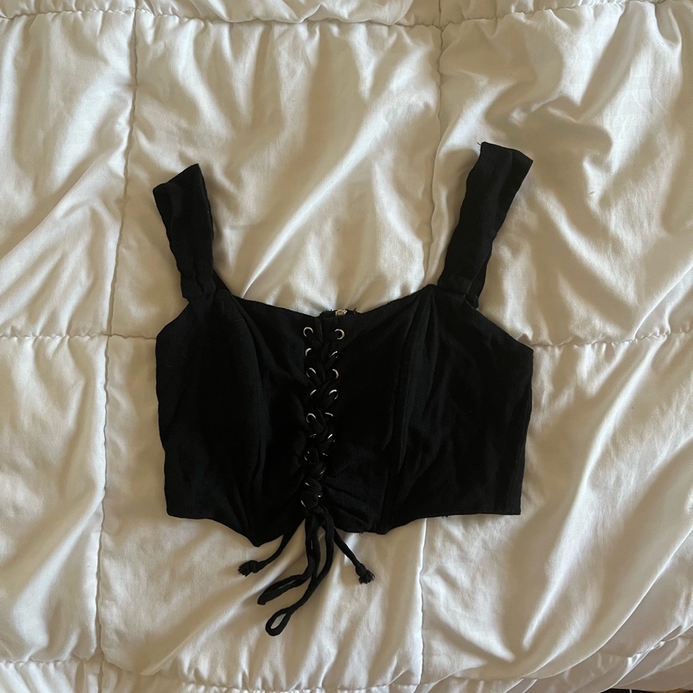 black corset top with lace-up front and zipper back